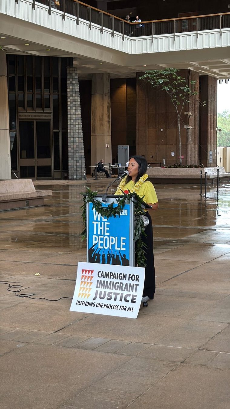 Fellow Abigail Olipani speaking at the podium at the Hawaiʻi State Capitol