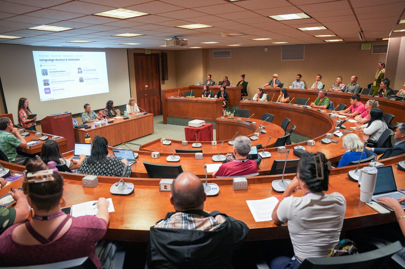 The Language Access and Inclusion panel on screen in the Pacific Room
